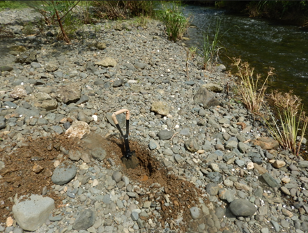 Gravel, Cobble, Boulder cover layer on the Rio De La Plata and a pit that shows a much sandier subsurface layer.  (picture by Andrew Branard)