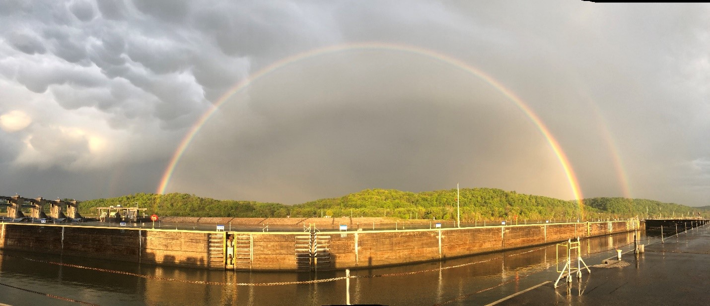 Photo of a double rainbow centered around the Belleville Lock and Dam